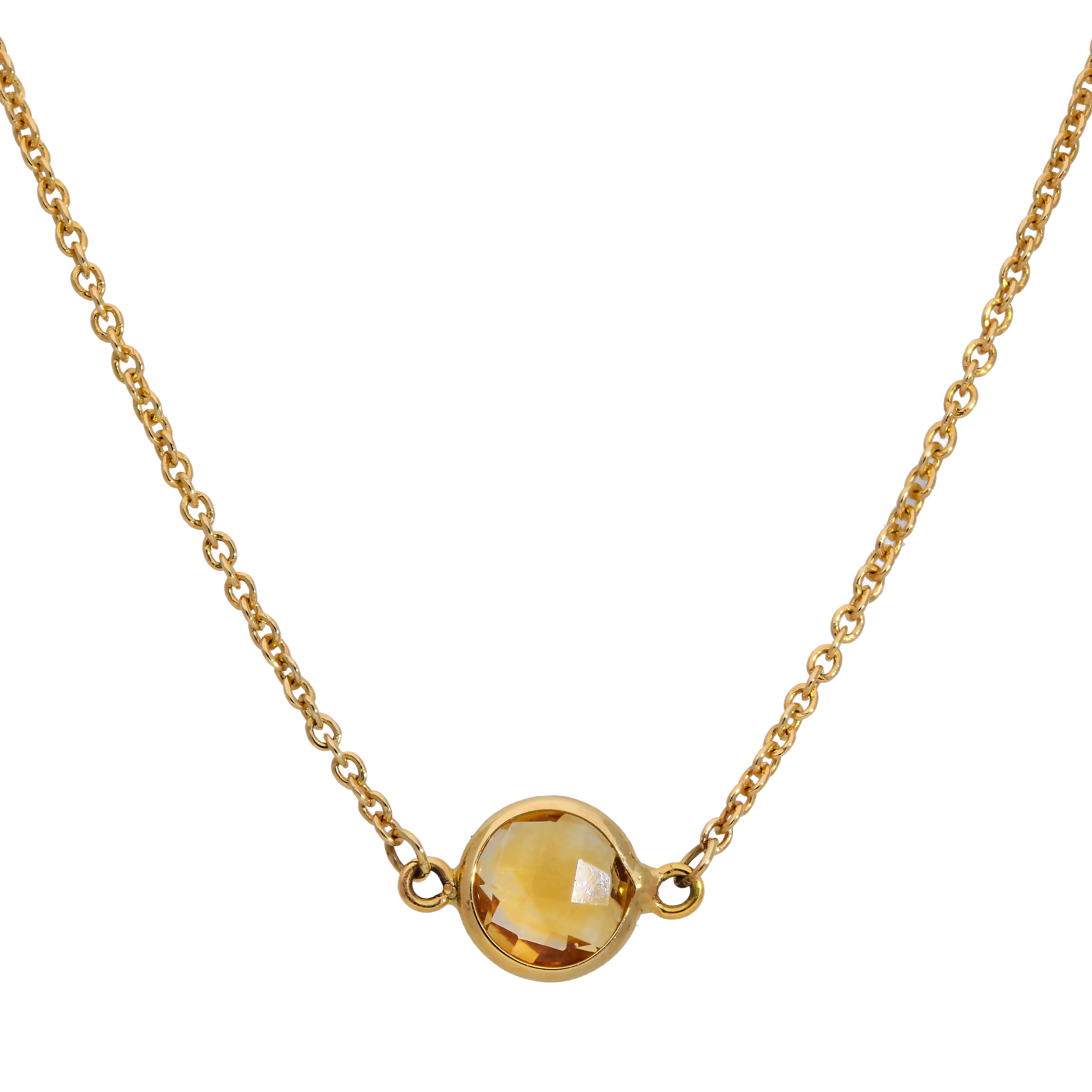 Gold necklace with a round yellow gemstone on a white background