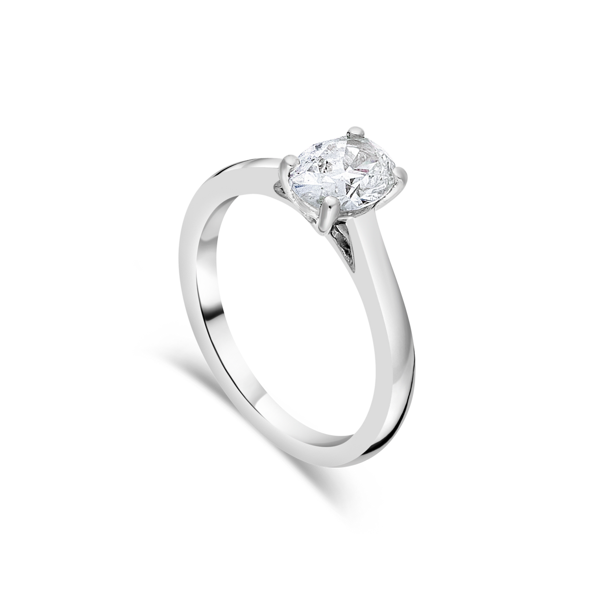 Diamond oval engagement ring from Appleby Jewellers Dublin with a sleek band and sparkling central stone.