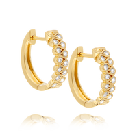 Yellow Gold Diamond Wave Huggie Earrings