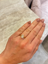 Oval diamond engagement ring with 1.50 carats from Appleby Jewellers Dublin, showcasing a sparkling solitaire design.