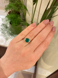 Emerald and diamond Tranquility Trilogy ring by Appleby Jewellers Dublin featuring three sparkling gemstones in a classic setting.