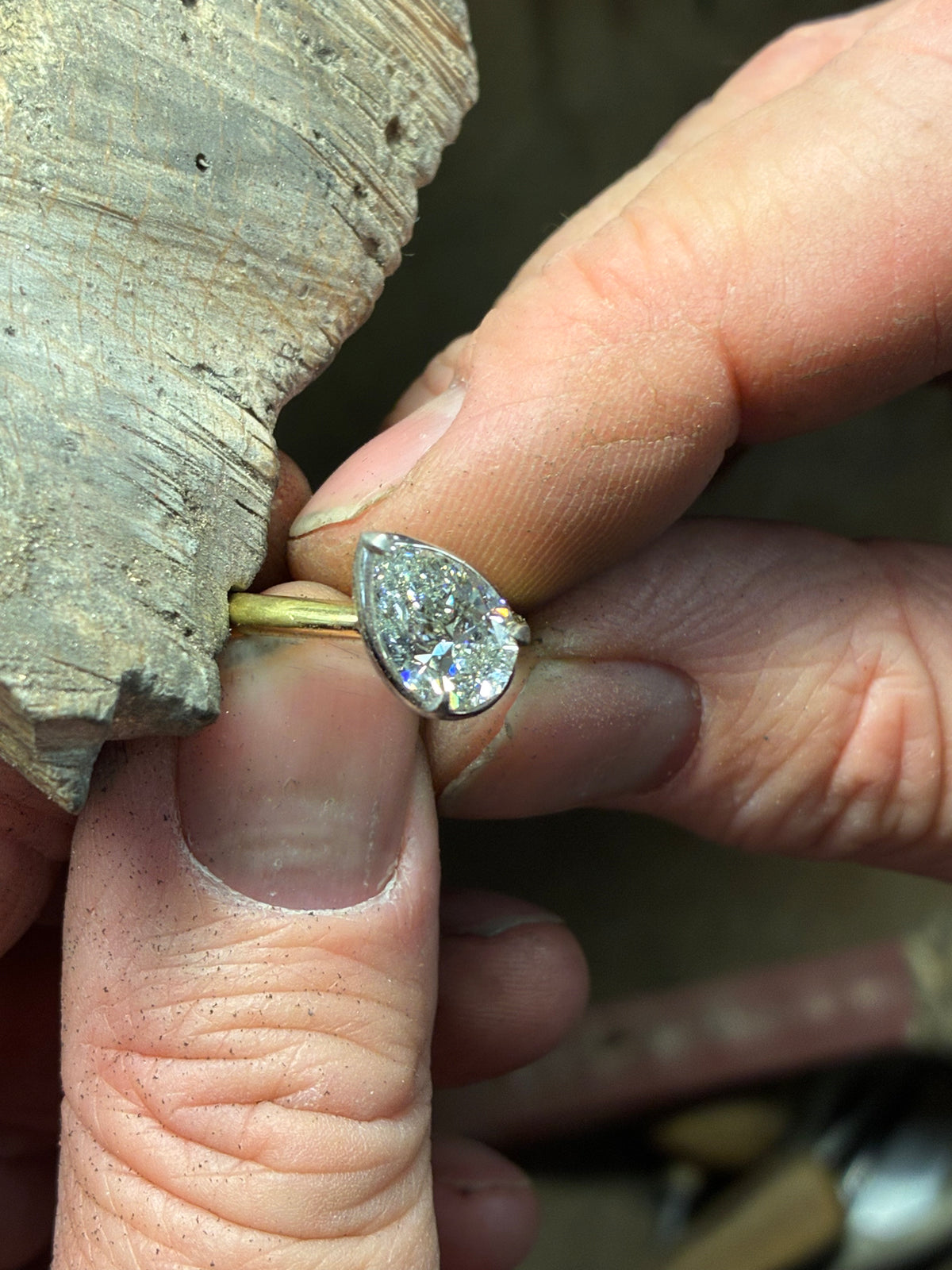 Tilted Pear Diamond Bezel Ring by Appleby Jewellers Dublin displaying a 2.51ct pear-shaped diamond set in a sleek bezel setting.