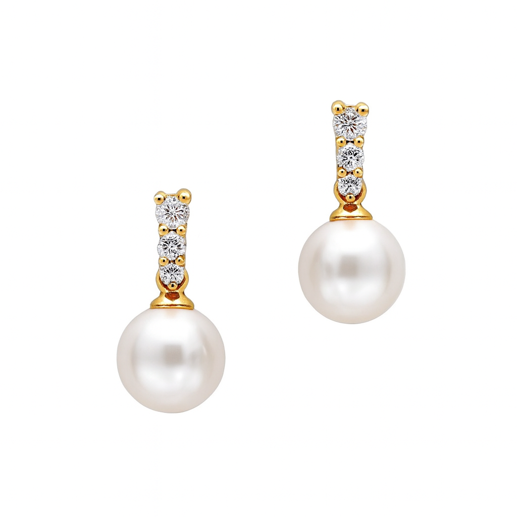 18ct gold diamond and pearl drop earrings with 0.20ct diamonds, featuring elegant pearl accents, by Appleby Jewellers Dublin