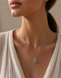 18ct White Gold Emerald & Diamond Pendant