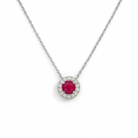 18ct white gold ruby and diamond halo pendant necklace with a central yellow diamond, crafted by Appleby Jewellers Dublin.