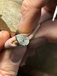 Tilted Pear Diamond Bezel Ring featuring a 2.51ct diamond, crafted by Appleby Jewellers Dublin, showcasing elegant jewelry design.