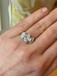 Diamond engagement ring with an oval-shaped center stone, featuring a 3.83ct Trinity design by Appleby Jewellers Dublin.