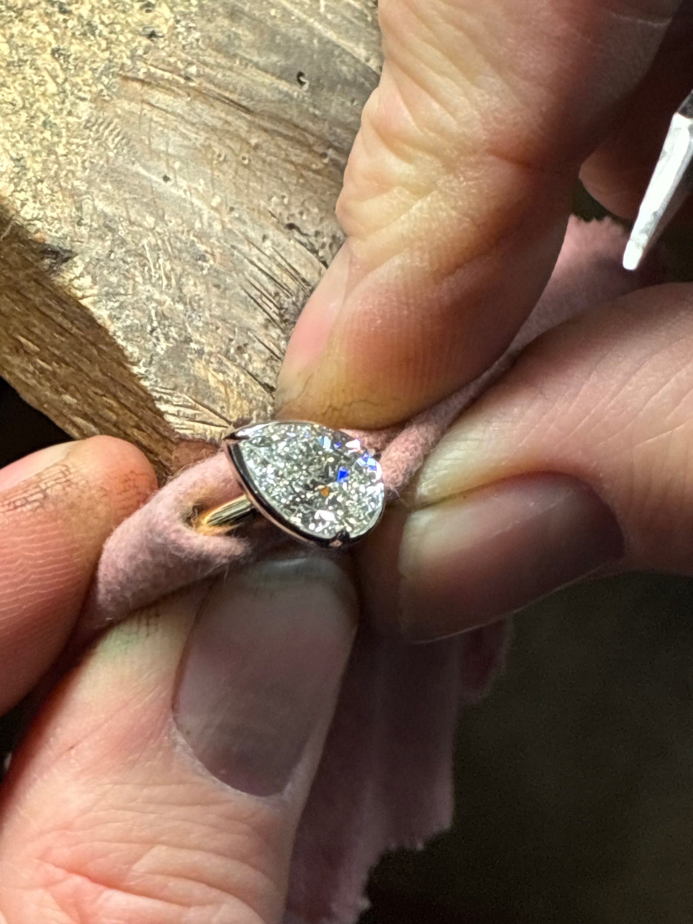 Tilted Pear Diamond Bezel Ring showcasing a 2.51ct pear-shaped diamond set in a sleek bezel, crafted by Appleby Jewellers Dublin.