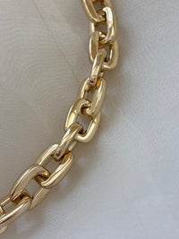 9ct yellow gold squared link chain necklace from Appleby Jewellers Dublin, close-up of the elegant geometric gold links.