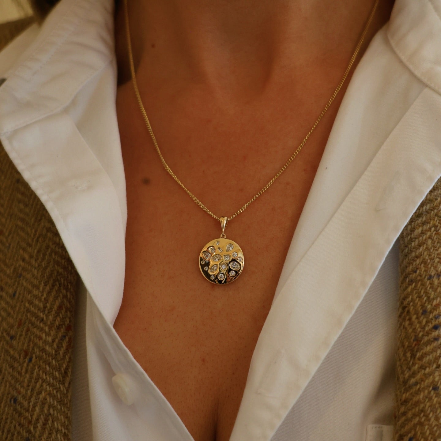 Medium Cosmos Pendant necklace by Appleby Jewellers Dublin featuring a celestial design with intricate details.