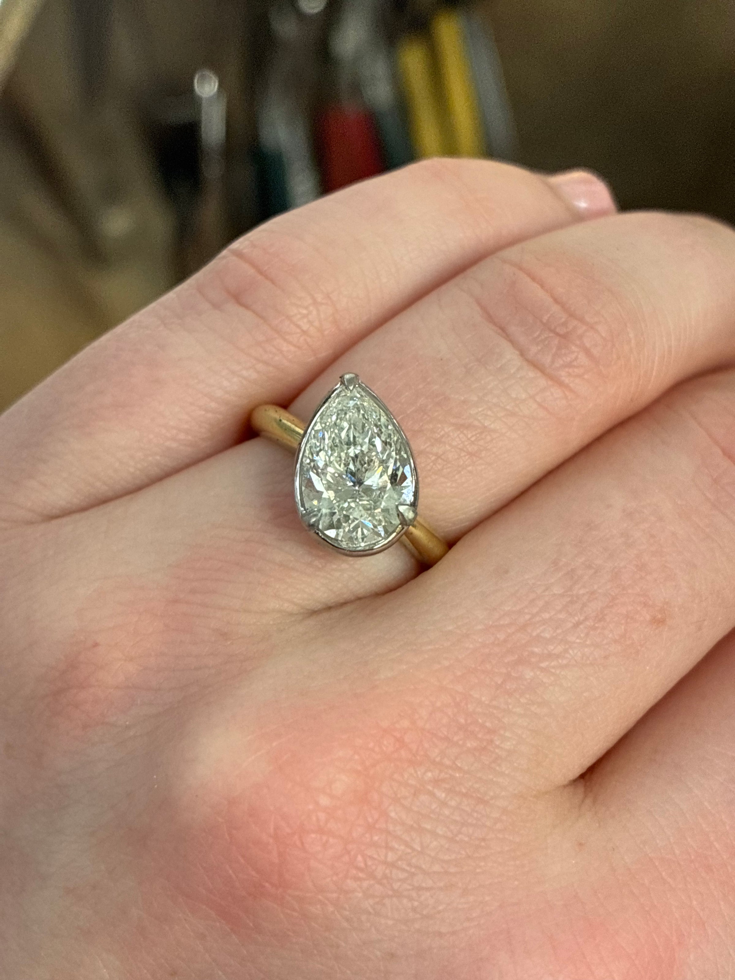 Tilted Pear Diamond Bezel Ring with 2.51ct diamond, crafted by Appleby Jewellers Dublin, featuring a sleek modern design.