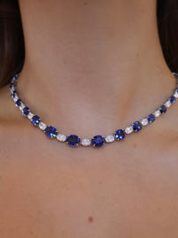 Elegant sapphire and diamond collar bracelet by Appleby Jewellers Dublin featuring sparkling gemstones and intricate design.