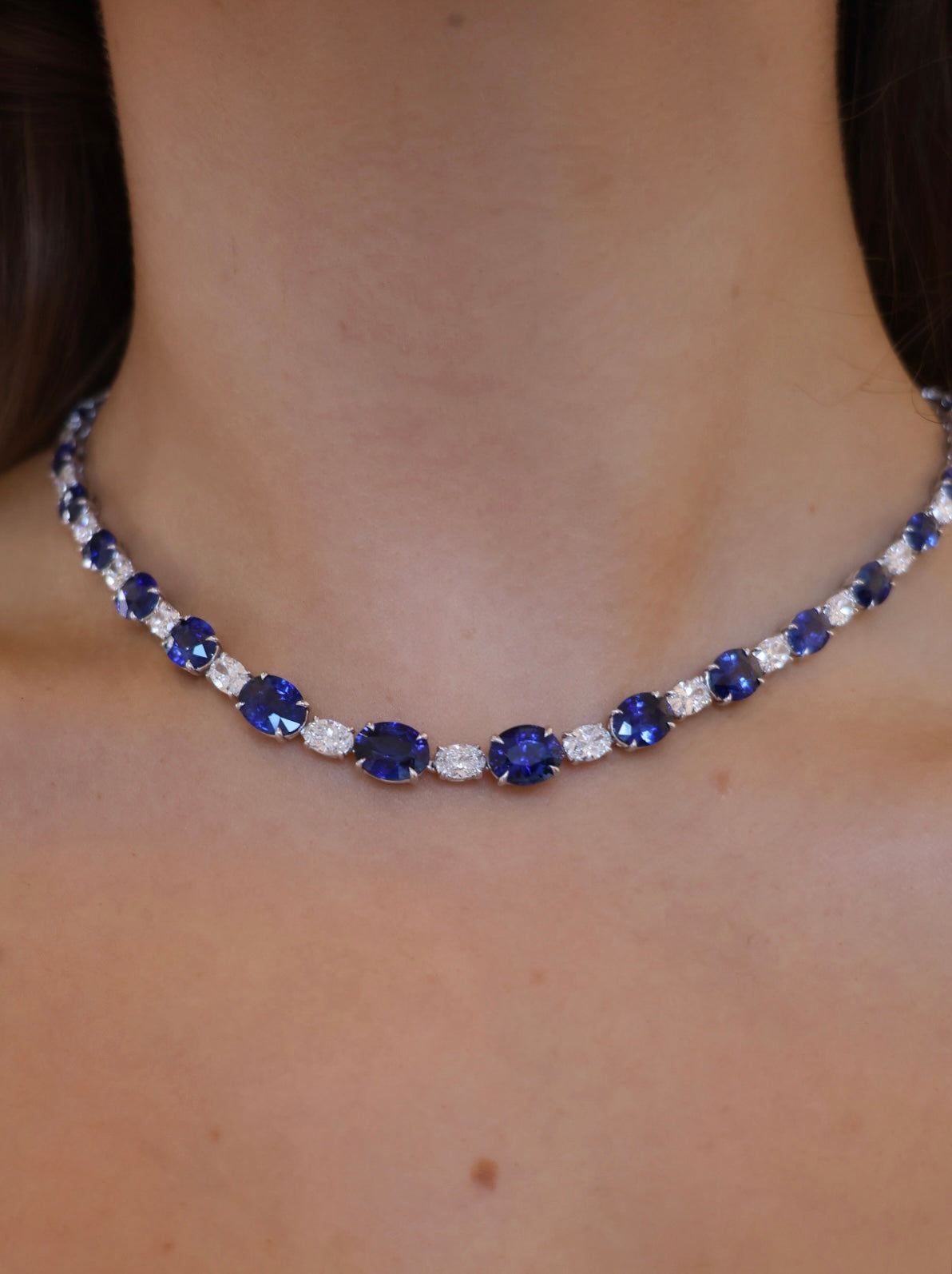 Elegant sapphire and diamond collar bracelet by Appleby Jewellers Dublin featuring sparkling gemstones and intricate design.