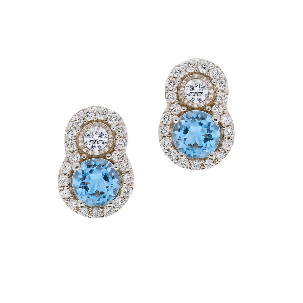 Elegant aquamarine and diamond earrings by Appleby Jewellers Dublin featuring sparkling gemstones and intricate silver settings.