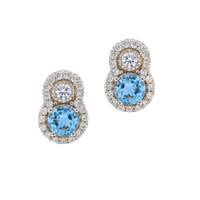 Elegant aquamarine and diamond earrings by Appleby Jewellers Dublin featuring sparkling gemstones and intricate silver settings.