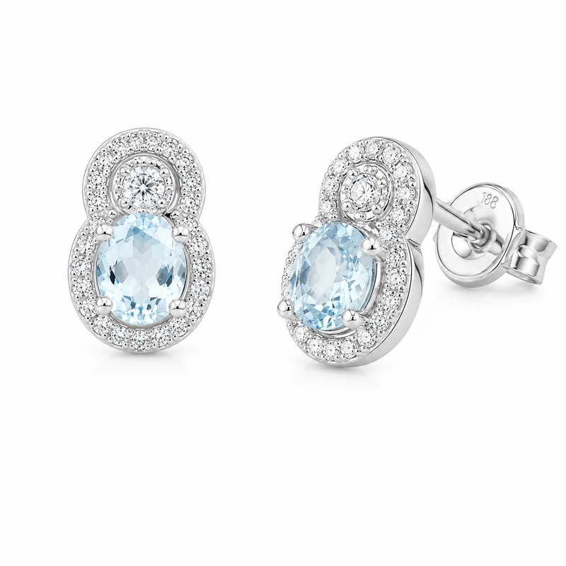 Elegant aquamarine and diamond earrings by Appleby Jewellers Dublin, showcasing sparkling gemstones in a delicate jewelry design.