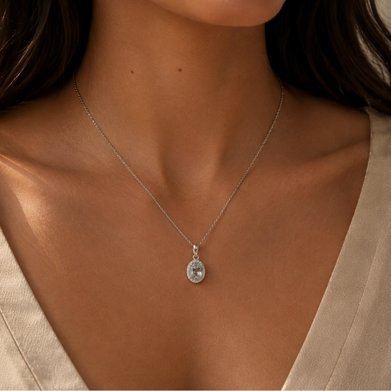 Aquamarine and diamond pendant necklace featuring a sparkling blue gemstone and dazzling diamonds, crafted by Appleby Jewellers Dublin.