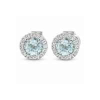 Aquamarine and diamond halo stud earrings in 18ct white gold, featuring sparkling stones and elegant design.