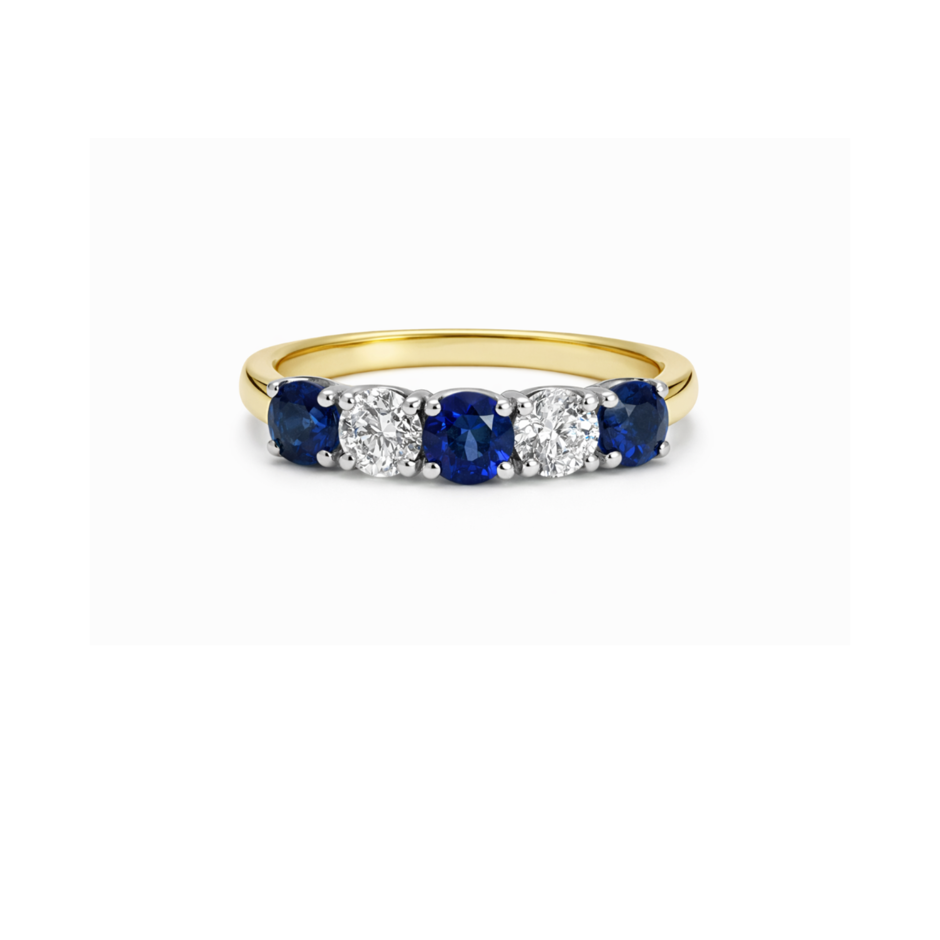 Elegant arc sapphire and diamond ring by Appleby Jewellers Dublin, showcasing a stunning gemstone design and fine craftsmanship.