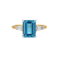 Aquamarine emerald cut ring with a sleek band, featuring a sparkling aquamarine gemstone, designed by Appleby Jewellers Dublin.