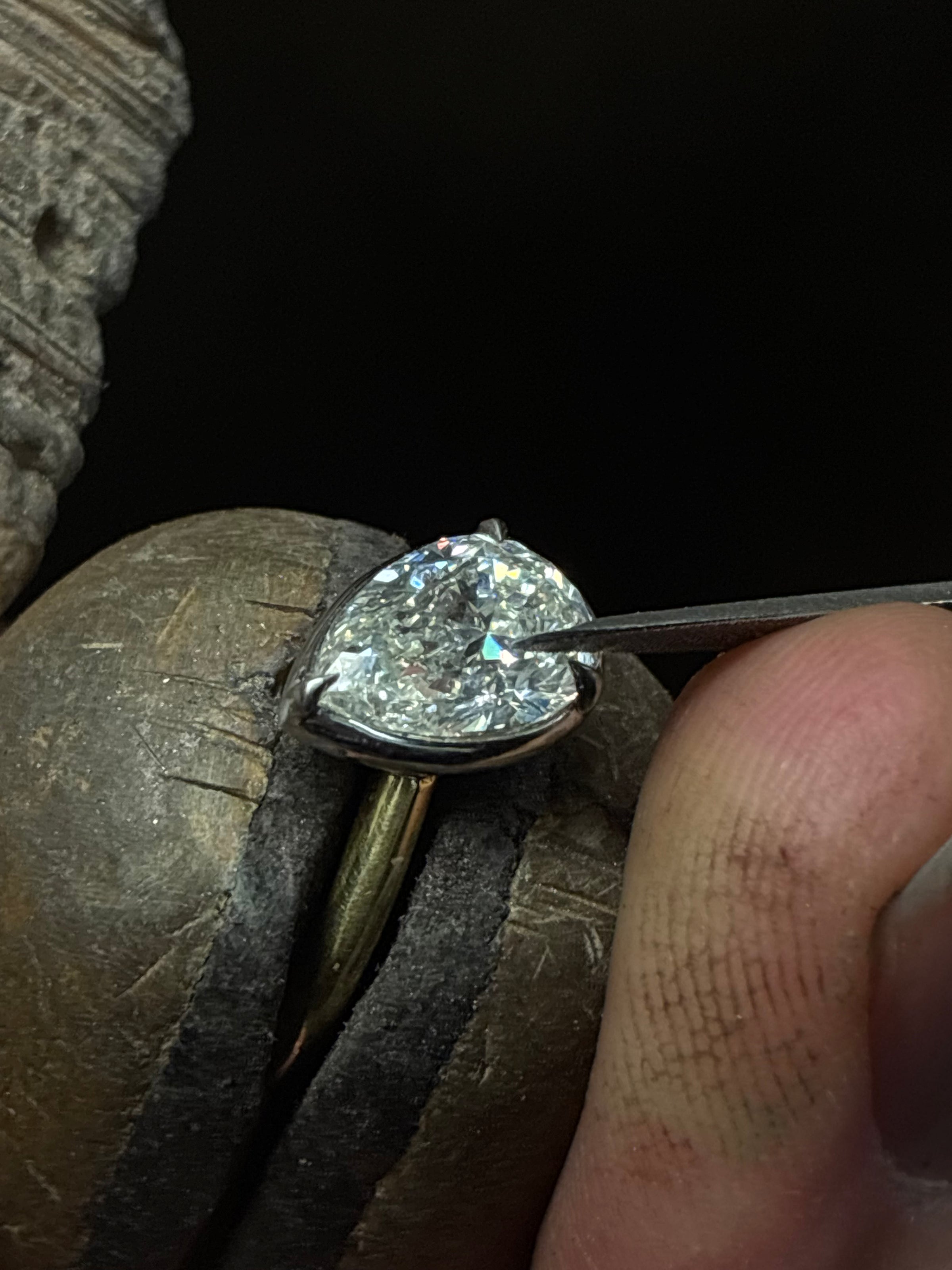 Tilted Pear Diamond Bezel Ring by Appleby Jewellers Dublin featuring a 2.51ct diamond, set in a sleek bezel setting.