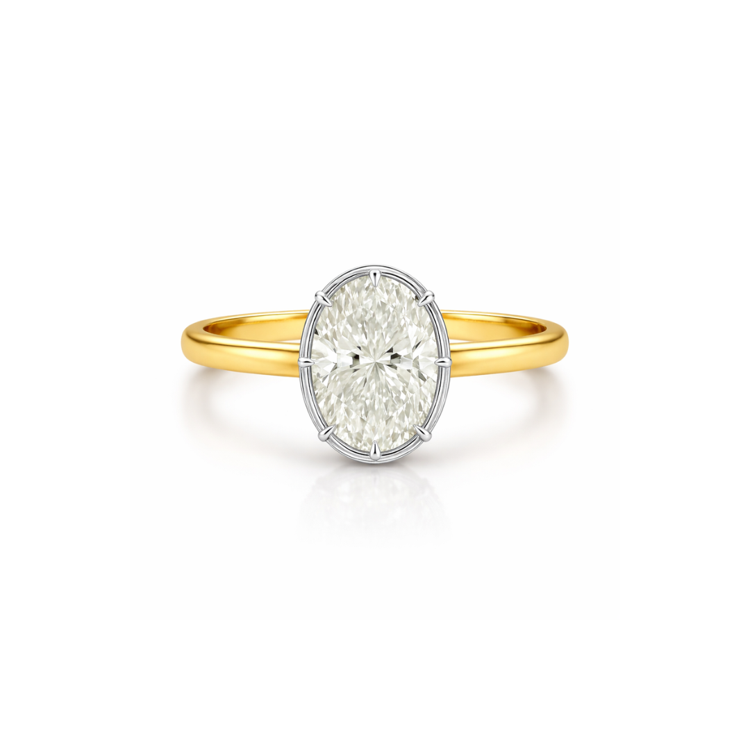 Elegant bezel oval ring featuring a central gemstone, crafted by Appleby Jewellers Dublin, showcasing fine jewelry design.