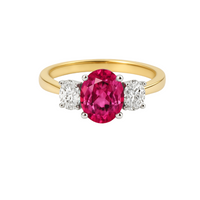 Blue sapphire set in an Ascot pink sapphire diamond ring by Appleby Jewellers Dublin, showcasing elegant jewelry craftsmanship.