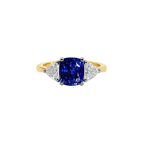 Blue sapphire cushion cut ring with a vibrant blue gemstone set in a silver band, elegant jewelry piece by Appleby Jewellers Dublin.