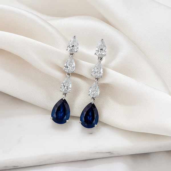 Blue sapphire and diamond trio earrings by Appleby Jewellers Dublin, showcasing elegant gemstone-studded earrings.