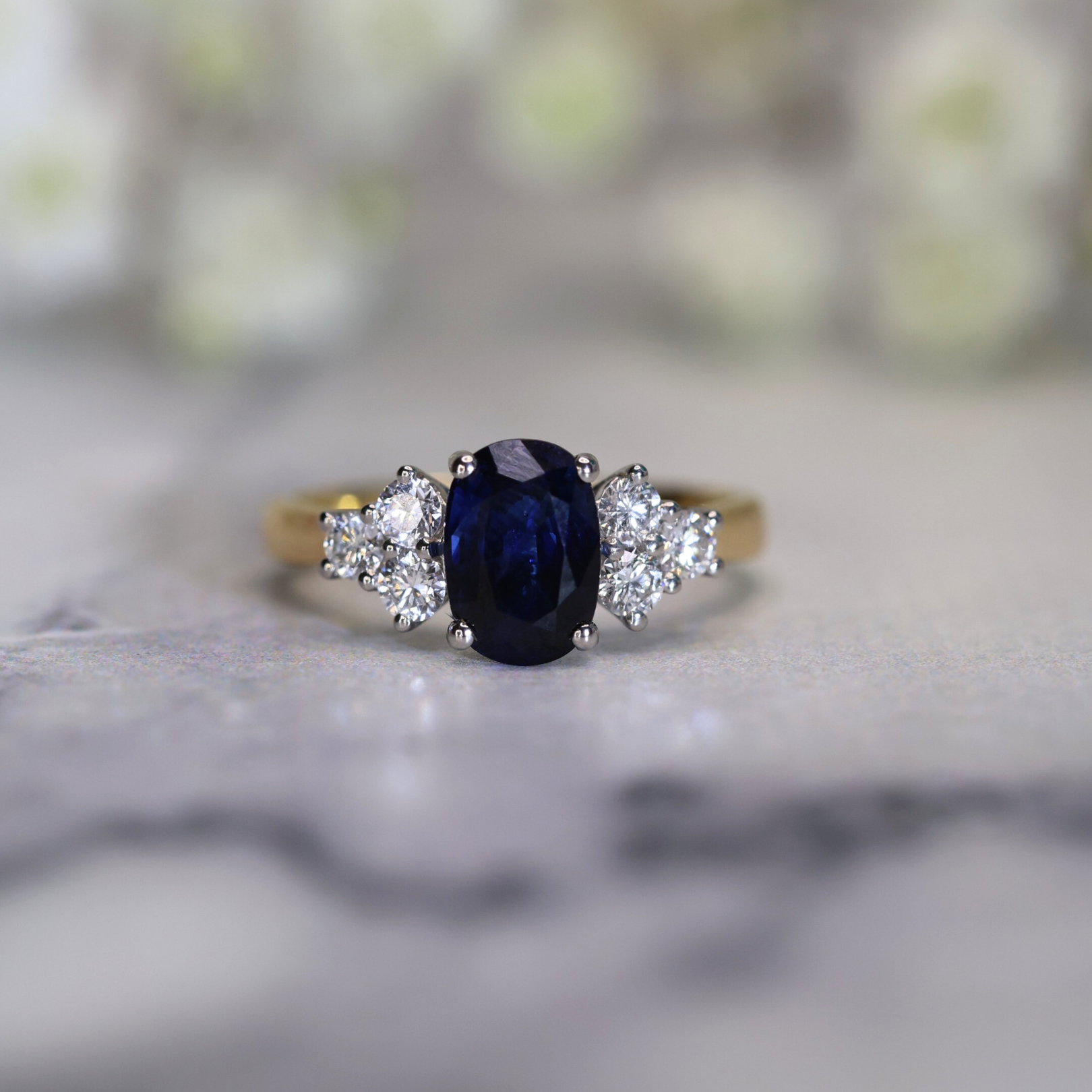 Fine Blue Sapphire & Six Diamond Cluster