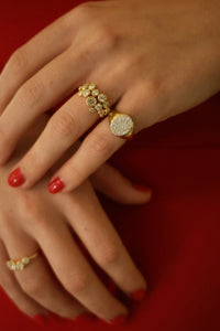 Elegant Waterlily Diamond Ring by Appleby Jewellers Dublin featuring a delicate diamond flower design on a silver band.
