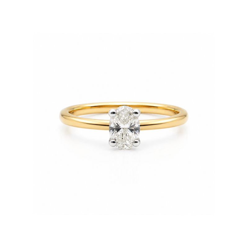 Oval solitaire diamond engagement ring with 0.65 carats by Appleby Jewellers Dublin, featuring a sleek design and sparkling diamond.