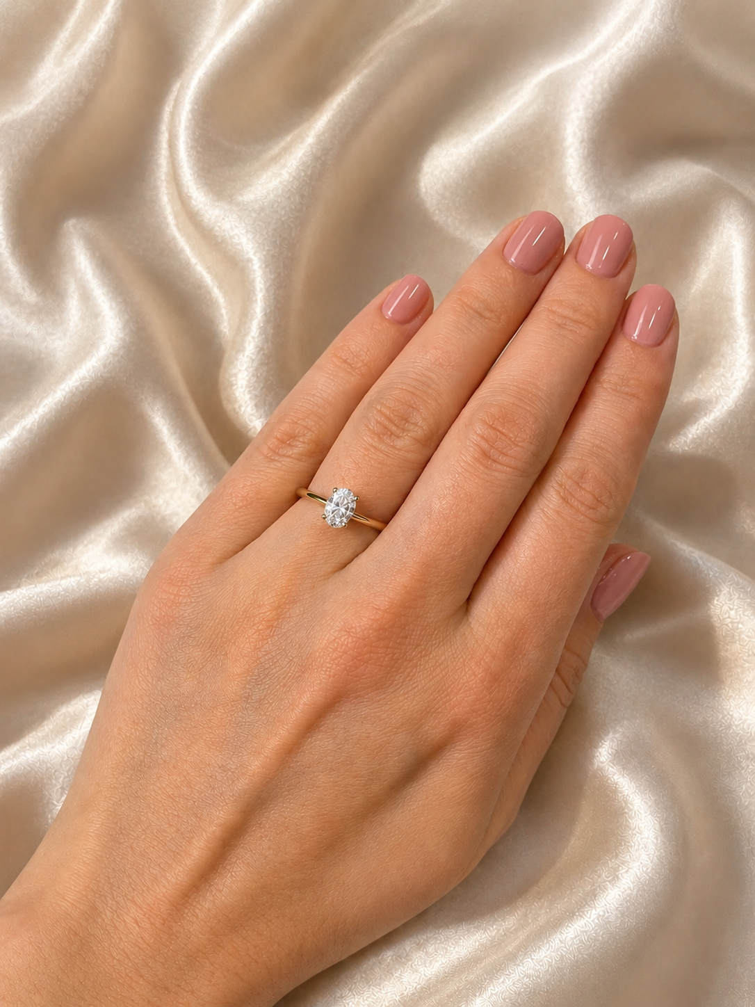 Oval solitaire diamond engagement ring with 0.65ct diamond from Appleby Jewellers Dublin, showcasing a classic and elegant design.