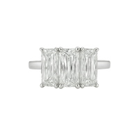 Elegant Criss-Cut Diamond Trilogy Ring by Appleby Jewellers Dublin featuring three sparkling diamonds on a silver band.