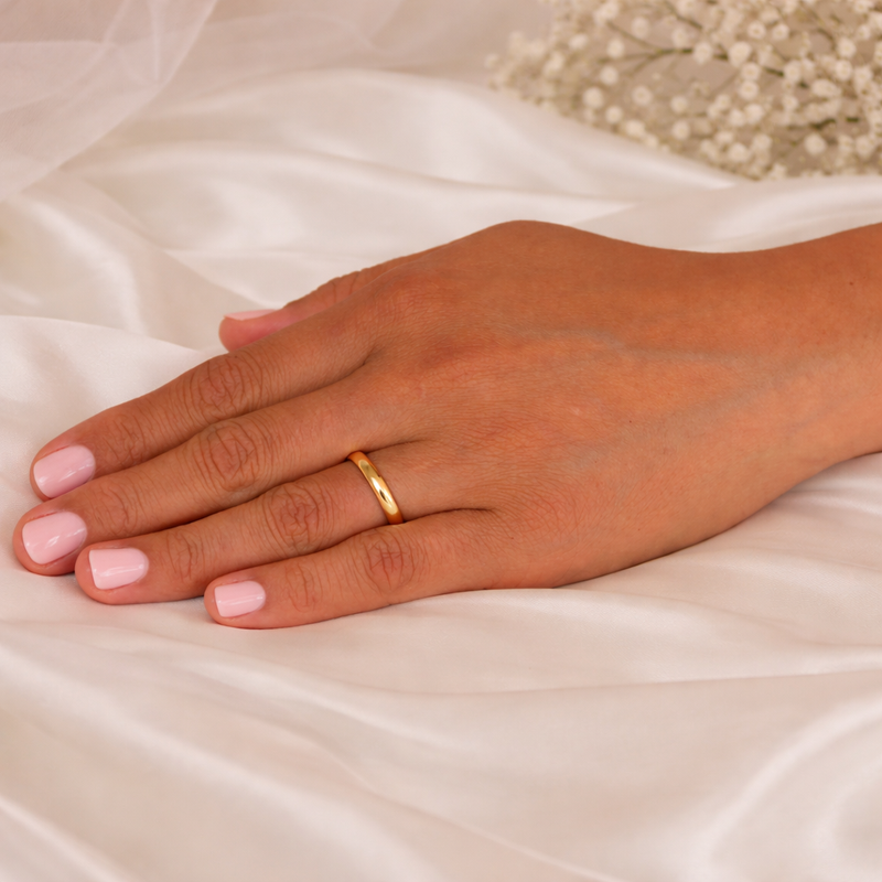 D-shaped ladies diamond wedding ring from Appleby Jewellers Dublin, featuring a sleek band with embedded diamonds.