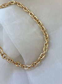 9ct yellow gold squared link chain necklace with a polished finish, showcasing a stylish and durable design from Appleby Jewellers Dublin.