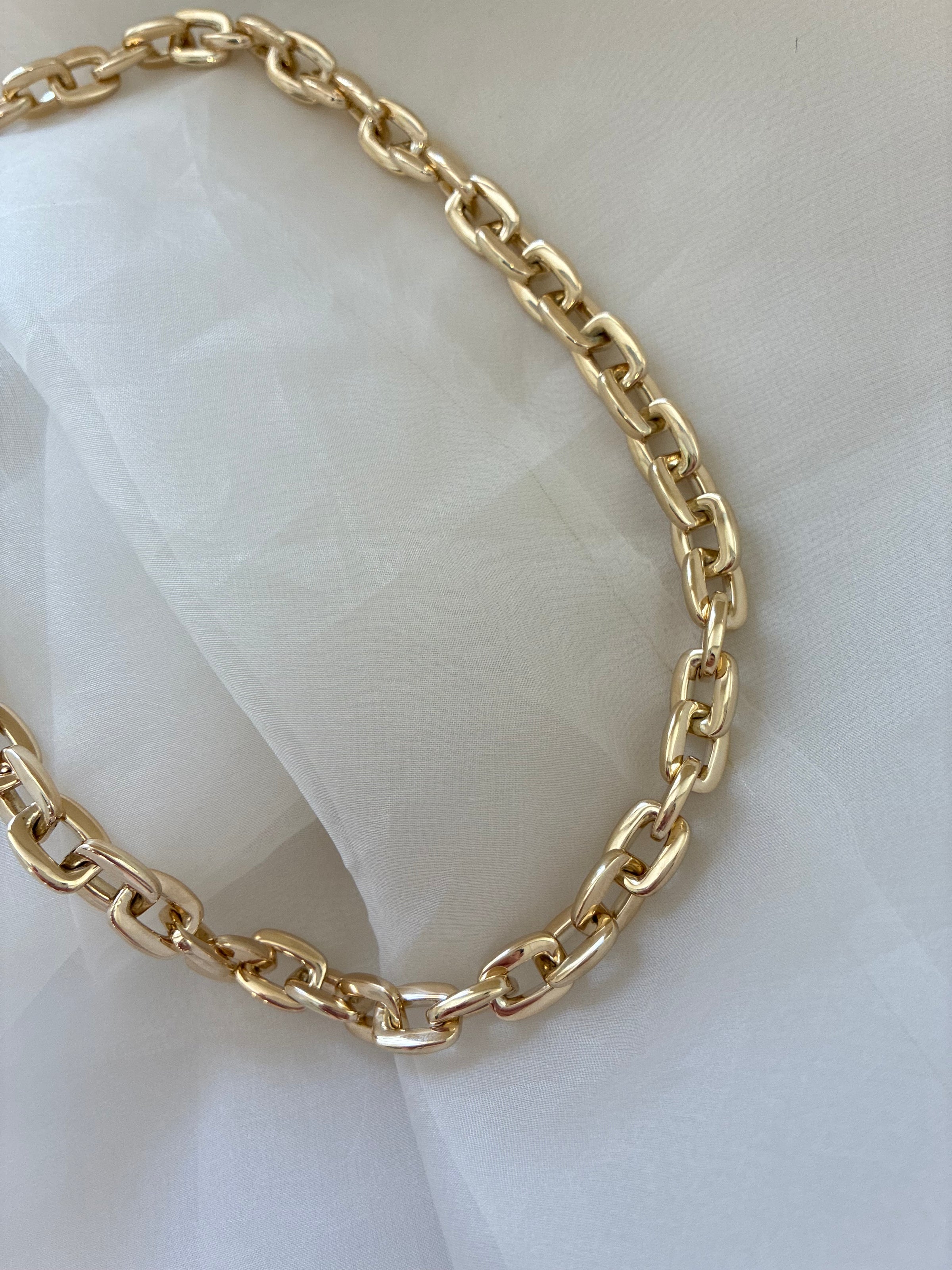 9ct yellow gold squared link chain necklace with a polished finish, showcasing a stylish and durable design from Appleby Jewellers Dublin.