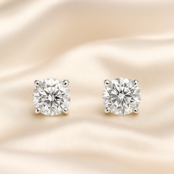 Elegant diamond stud earrings with 1.60ct F color diamonds, set in classic jewelry design by Appleby Jewellers Dublin.