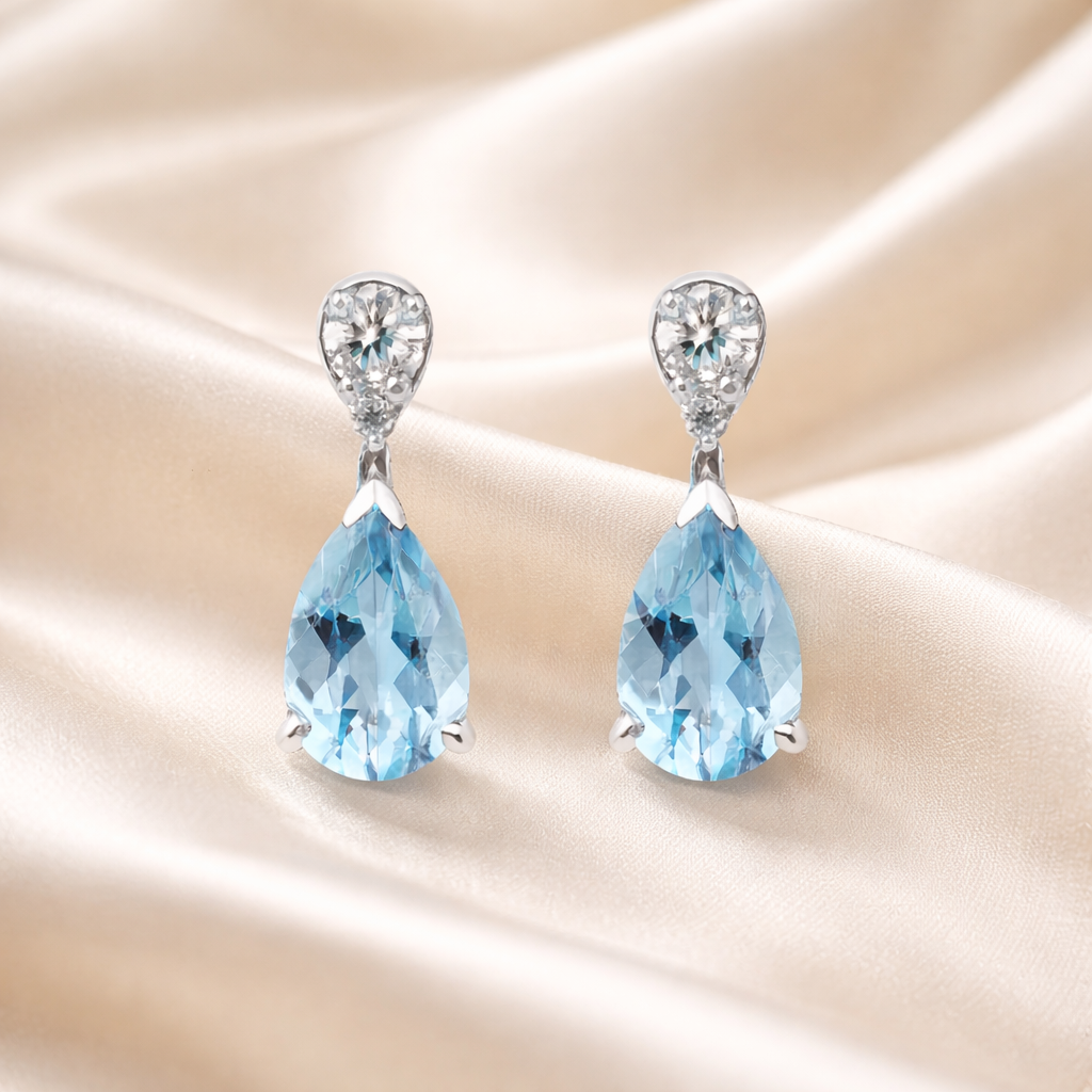 Elegant 18ct white gold aquamarine and diamond earrings with sparkling gemstones, designed by Appleby Jewellers Dublin.