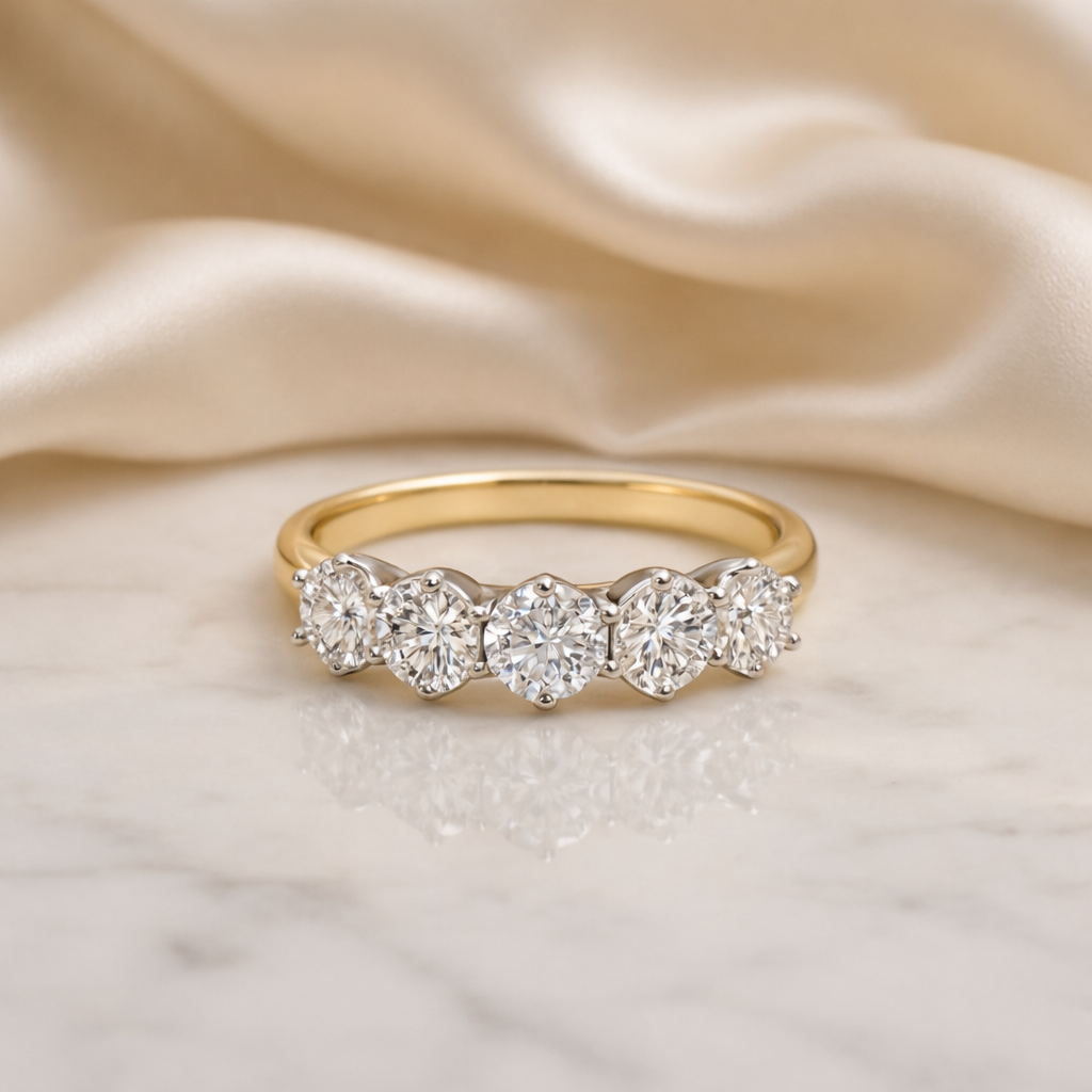 Elegant five-stone diamond ring with 3.64ct diamonds from Appleby Jewellers Dublin, displayed on a marble surface.