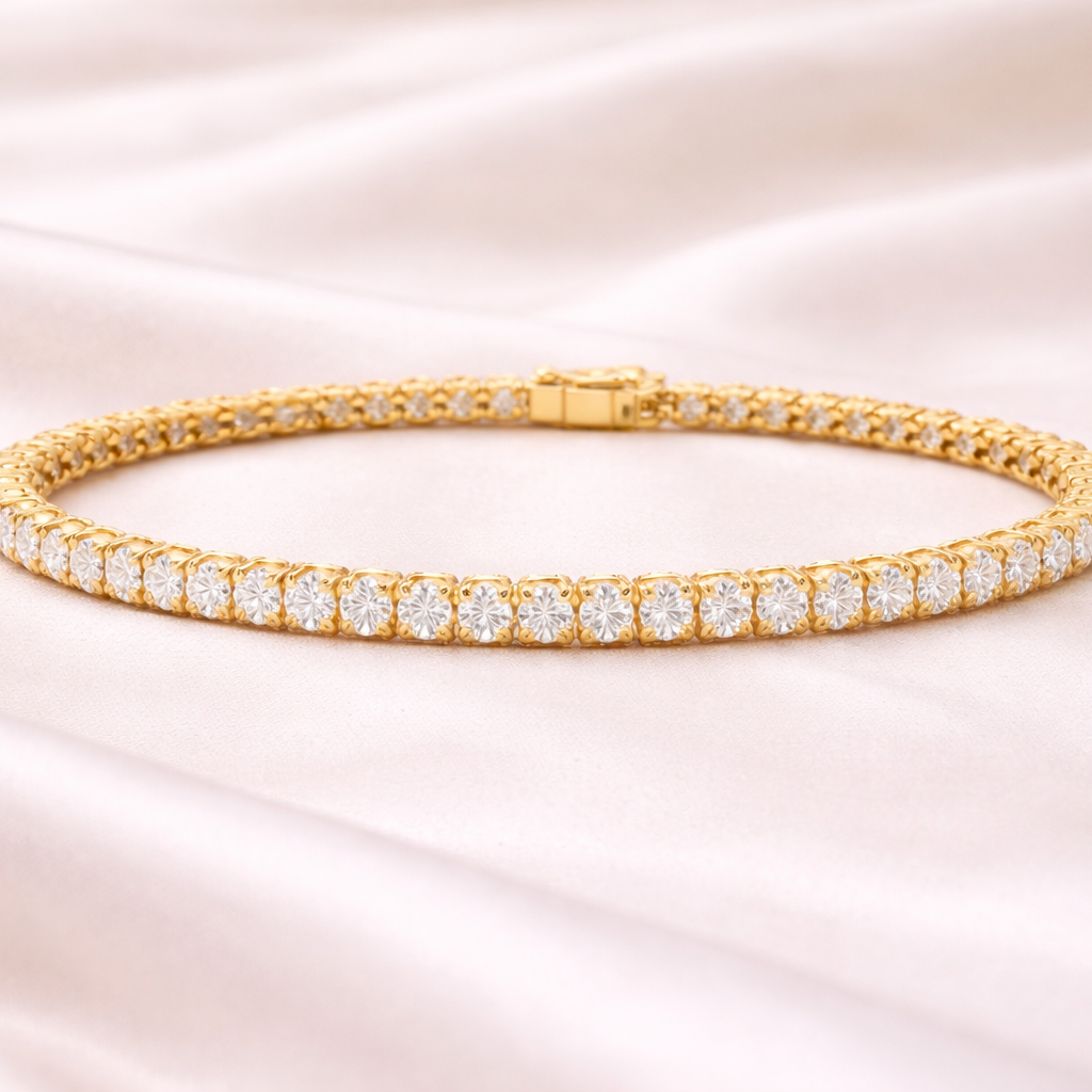 Elegant gold diamond tennis bracelet by Appleby Jewellers Dublin featuring sparkling diamond accents on a sleek design.