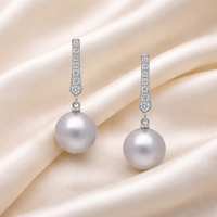 Elegant 18ct Tahitian pearl and diamond earrings featuring lustrous pearls and sparkling diamonds, crafted by Appleby Jewellers Dublin.