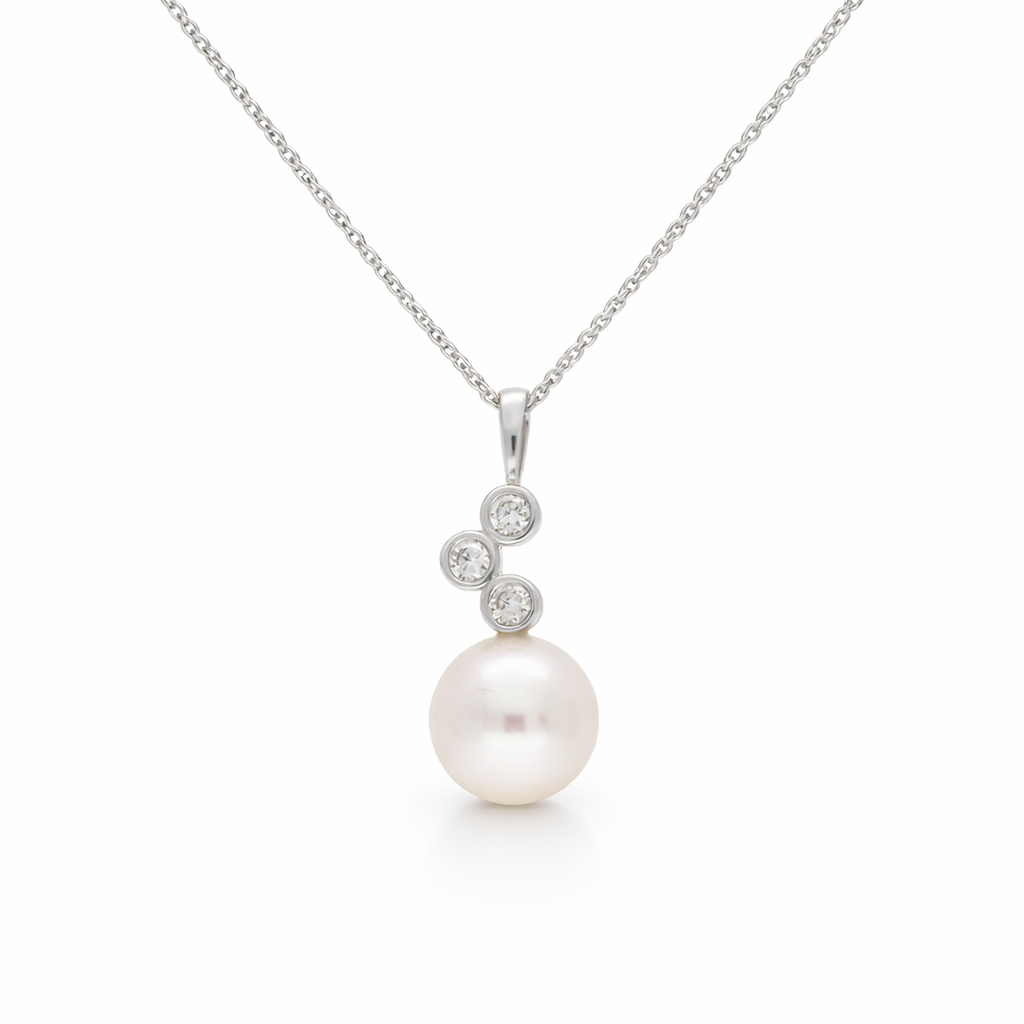 Elegant Pearl Diamond Trilogy necklace featuring a pearl centerpiece with diamond accents, crafted by Appleby Jewellers Dublin.