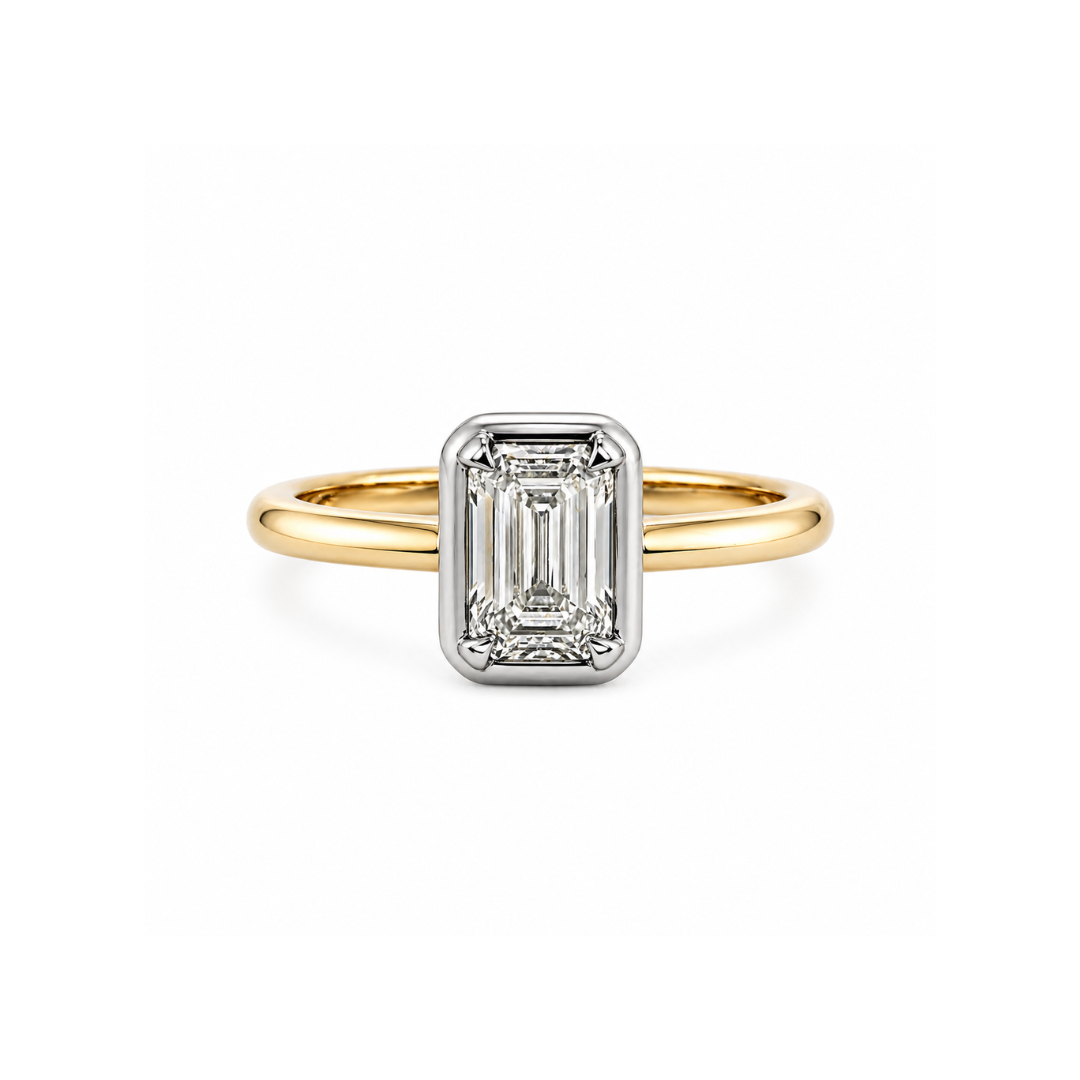 Emerald cut 1.51ct diamond bezel ring by Appleby Jewellers Dublin, showcasing a sleek gold band with a central emerald-cut diamond.