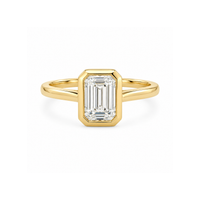Emerald cut diamond bezel ring from Appleby Jewellers Dublin, showcasing a 0.80-carat diamond setting on a sleek band.