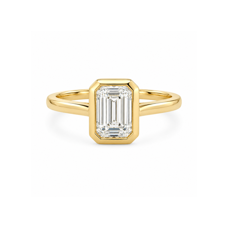 Emerald cut diamond bezel ring from Appleby Jewellers Dublin, showcasing a 0.80-carat diamond setting on a sleek band.