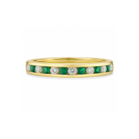 Emerald and diamond eternity ring by Appleby Jewellers Dublin featuring a continuous band of emeralds and sparkling diamonds.