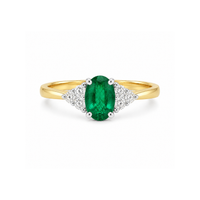 Emerald diamond ring from The Gatsby collection by Appleby Jewellers Dublin featuring a vibrant green emerald gemstone.
