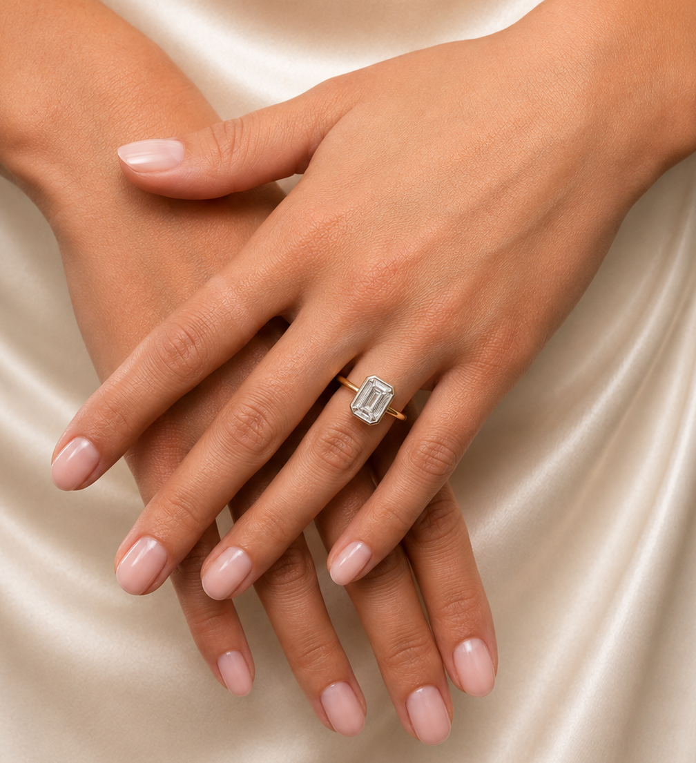 Emerald cut diamond bezel ring with 2.01 carats from Appleby Jewellers Dublin, showcasing a sleek, elegant design.