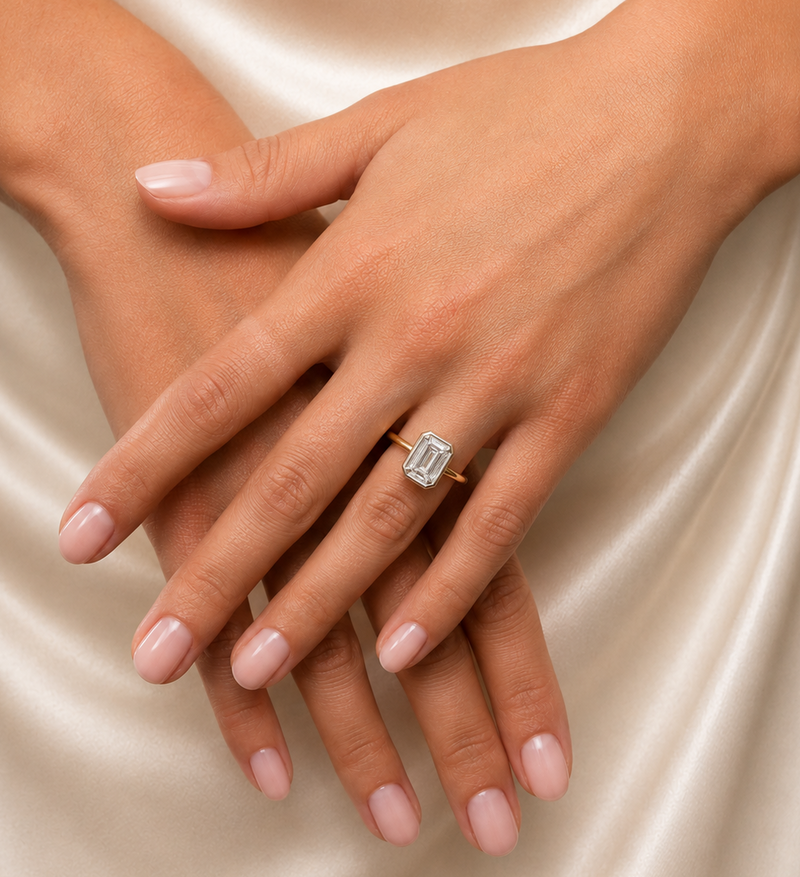 Emerald cut diamond bezel ring with 2.01 carats from Appleby Jewellers Dublin, showcasing a sleek, elegant design.